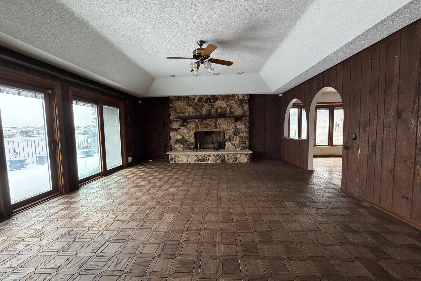 9630 Reding Circle Des Plaines, IL 60016 - Photo 9 of 32 a living room with a fireplace furniture and a large window