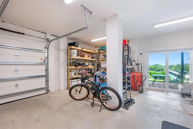 a view of a chairs and table in patio