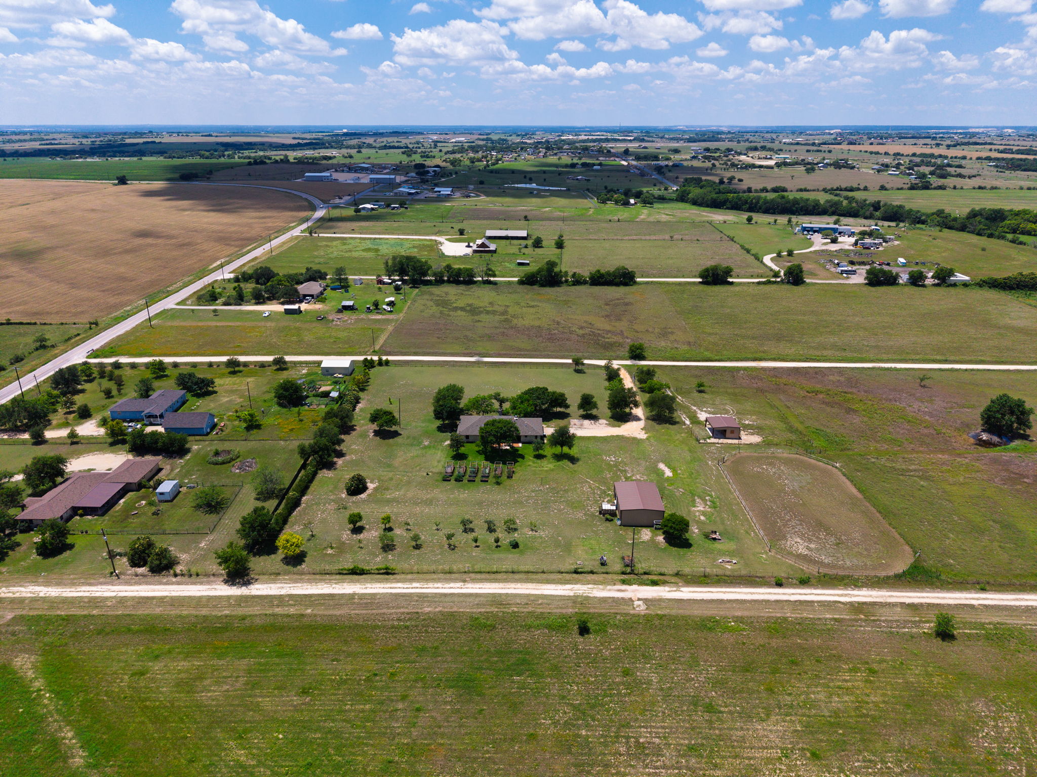 120 Rae Lane Jarrell, TX 76537 - Photo 11 of 40 Expansive rural landscape featuring multiple parcels of land, established homes, agricultural fields, and undeveloped green spaces