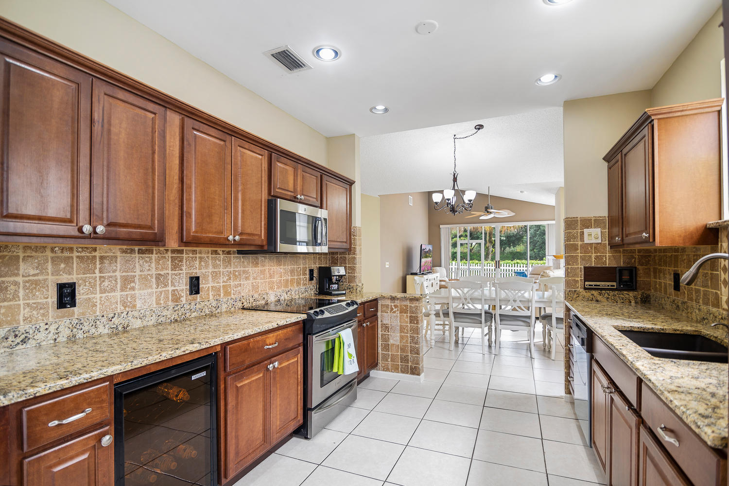 17640 Candlewood Terrace Boca Raton, FL 33487 - Photo 5 of 34 Kitchen to living