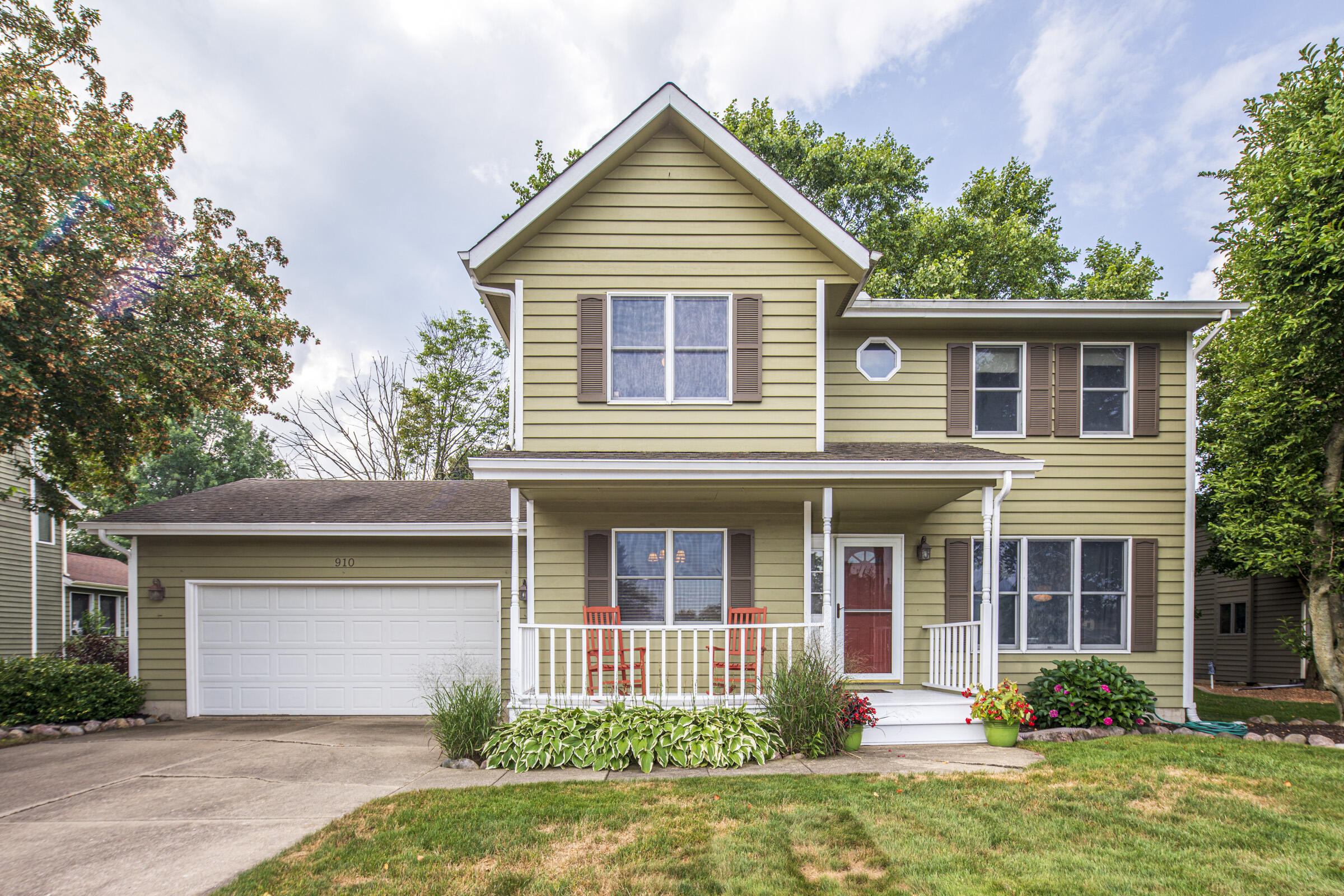 front view of a house and a yard