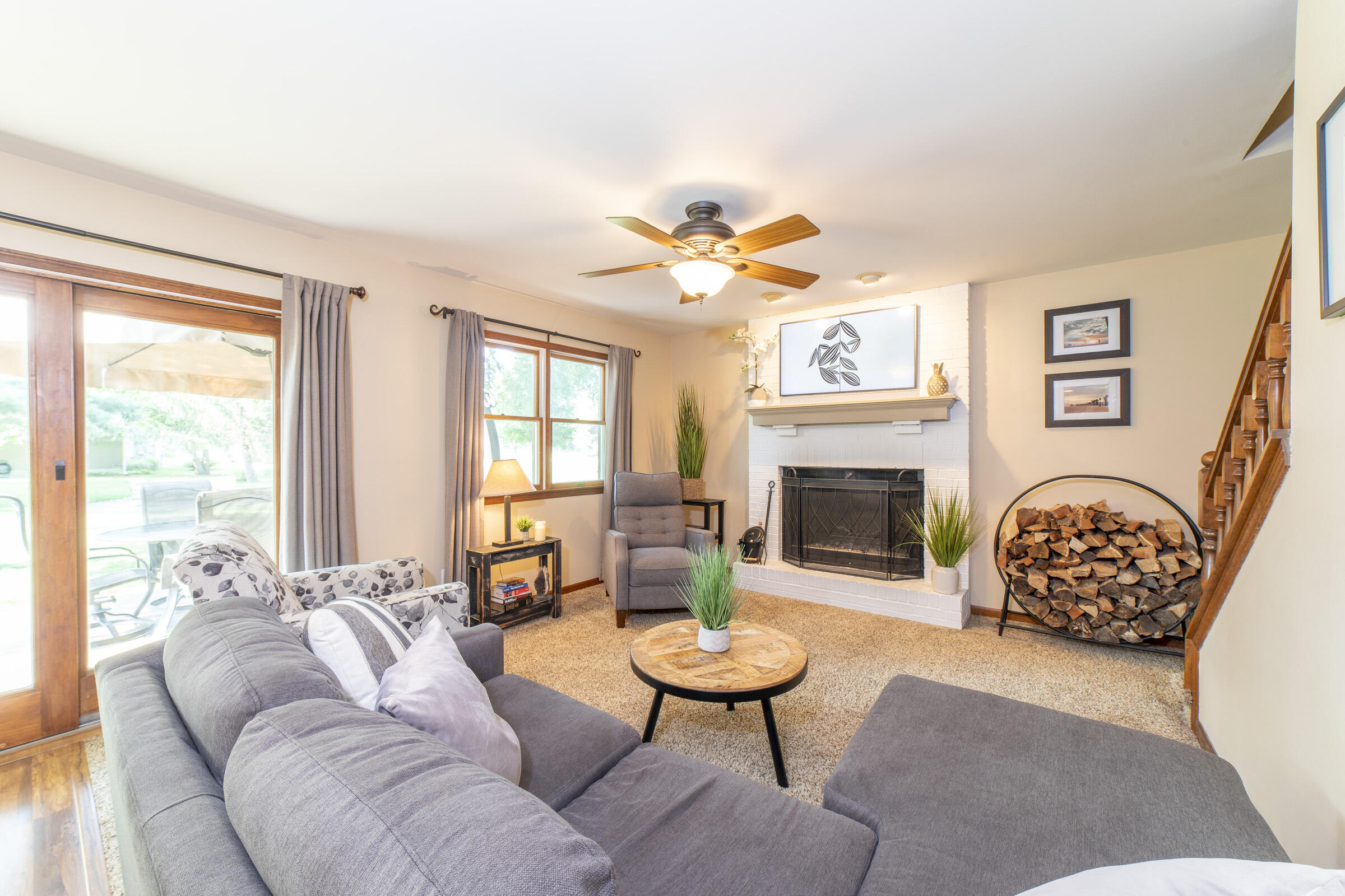 910 Read Drive Chesterton, IN 46304 - Photo 19 of 57 a living room with furniture a fireplace and a large window