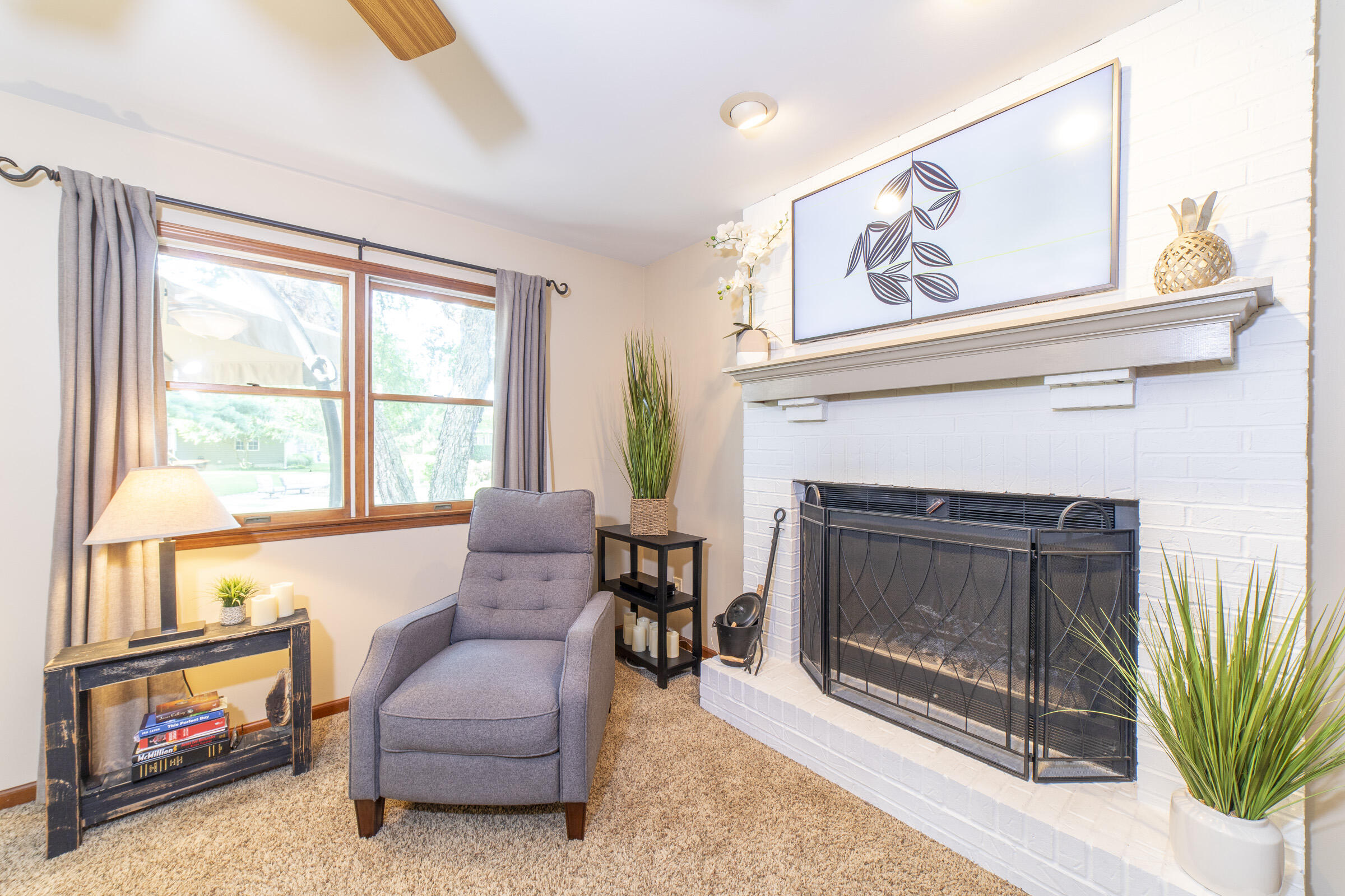 910 Read Drive Chesterton, IN 46304 - Photo 21 of 57 a living room with furniture a window and a fireplace