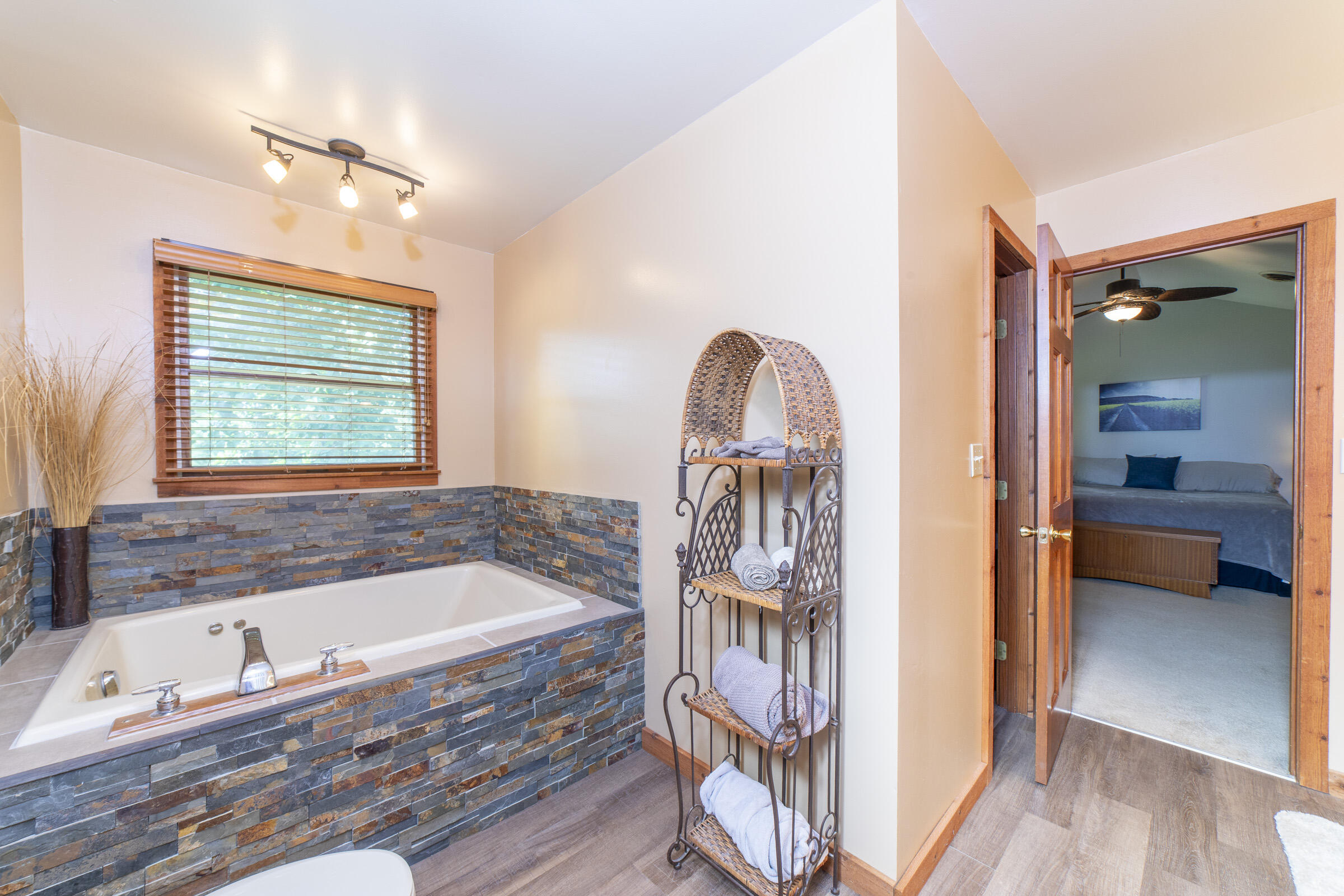 910 Read Drive Chesterton, IN 46304 - Photo 28 of 57 a bathroom with a tub a sink and a window