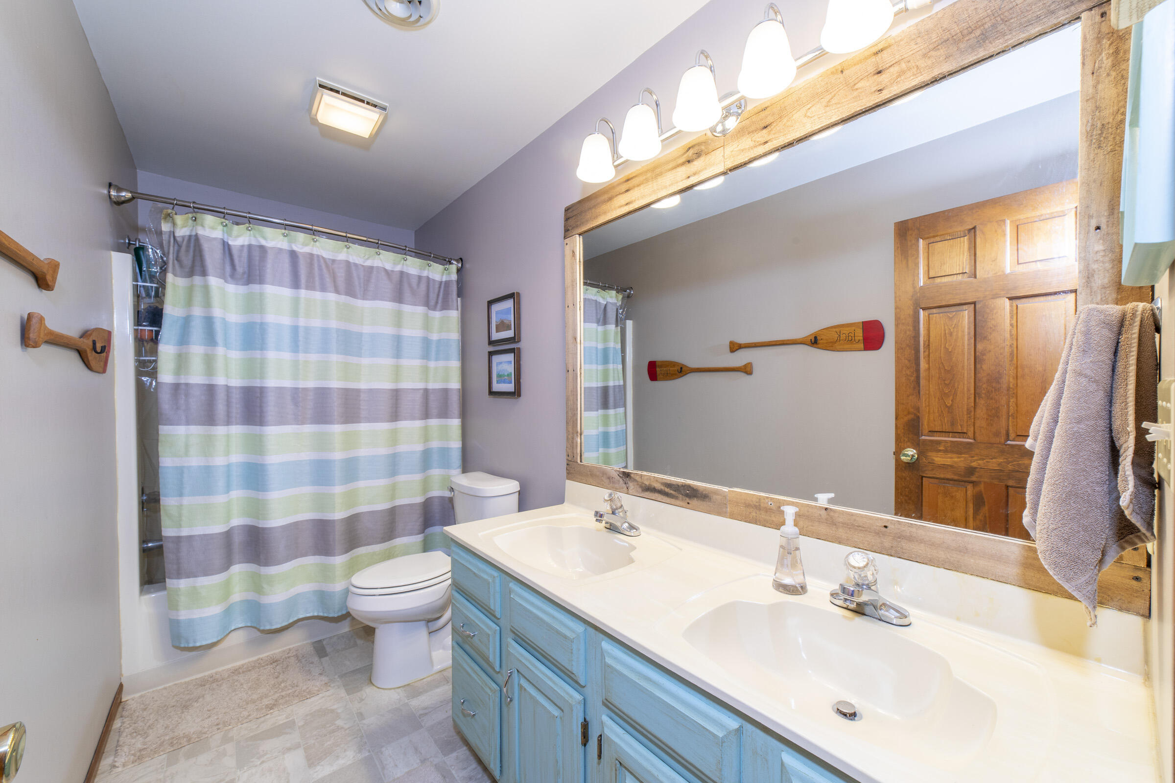 910 Read Drive Chesterton, IN 46304 - Photo 29 of 57 a bathroom with a sink toilet and shower