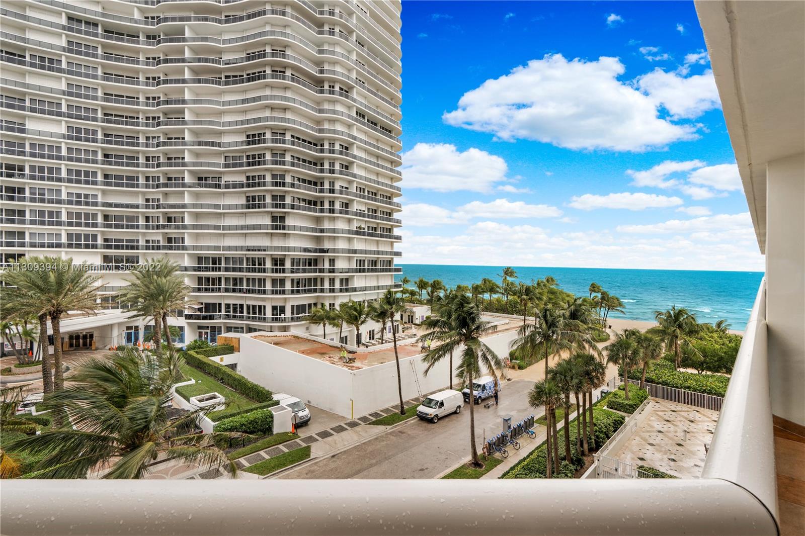 9595 Collins Avenue, Unit N5I Surfside, FL 33154 - Photo 1 of 35 a view of a balcony with chairs
