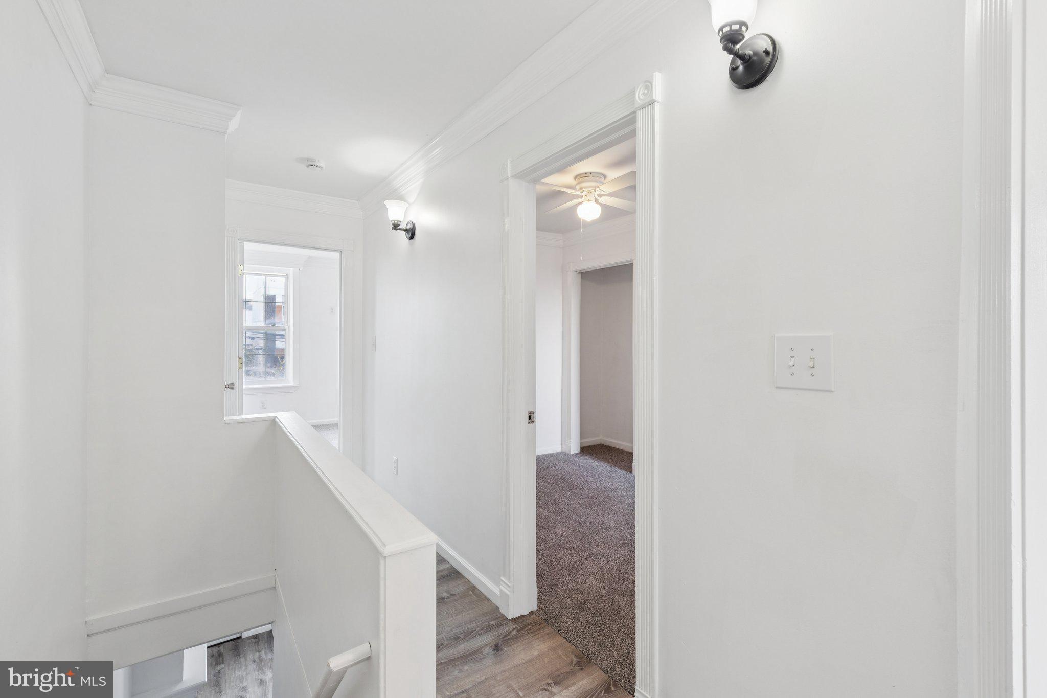 1444 North Perth Street Philadelphia, PA 19122 - Photo 13 of 27 a view of a hallway with windows and entryway