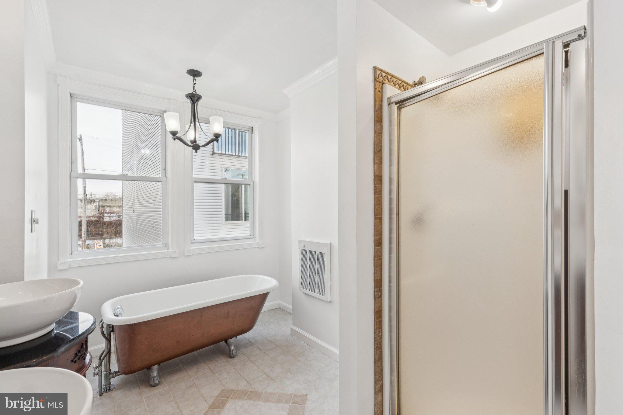 1444 North Perth Street Philadelphia, PA 19122 - Photo 19 of 27 a room with furniture and windows