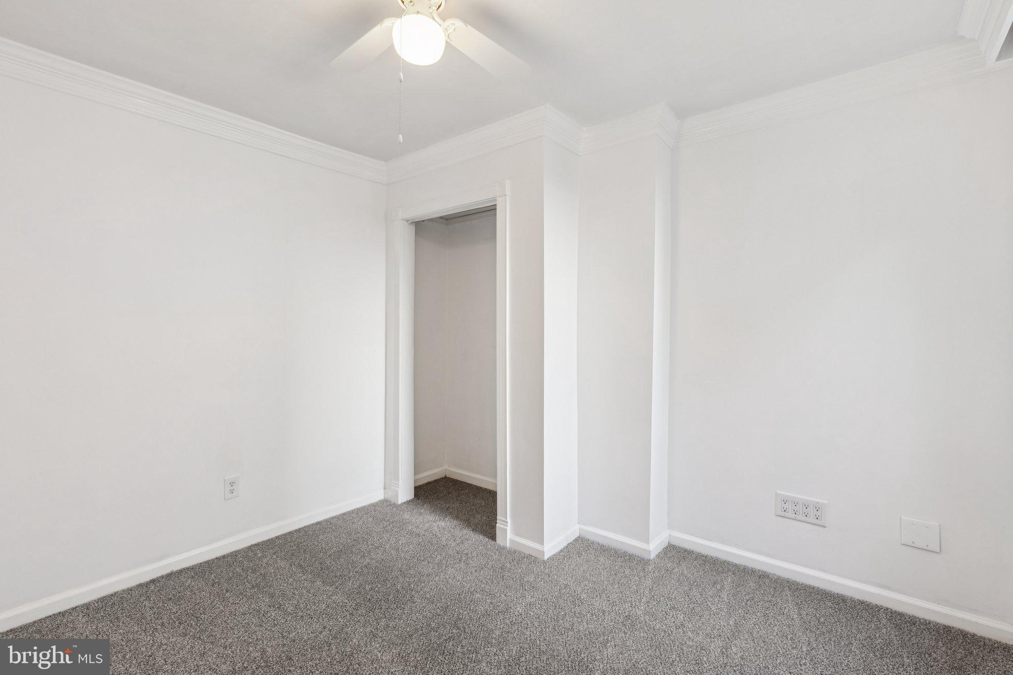 1444 North Perth Street Philadelphia, PA 19122 - Photo 22 of 27 an empty room with a ceiling fan