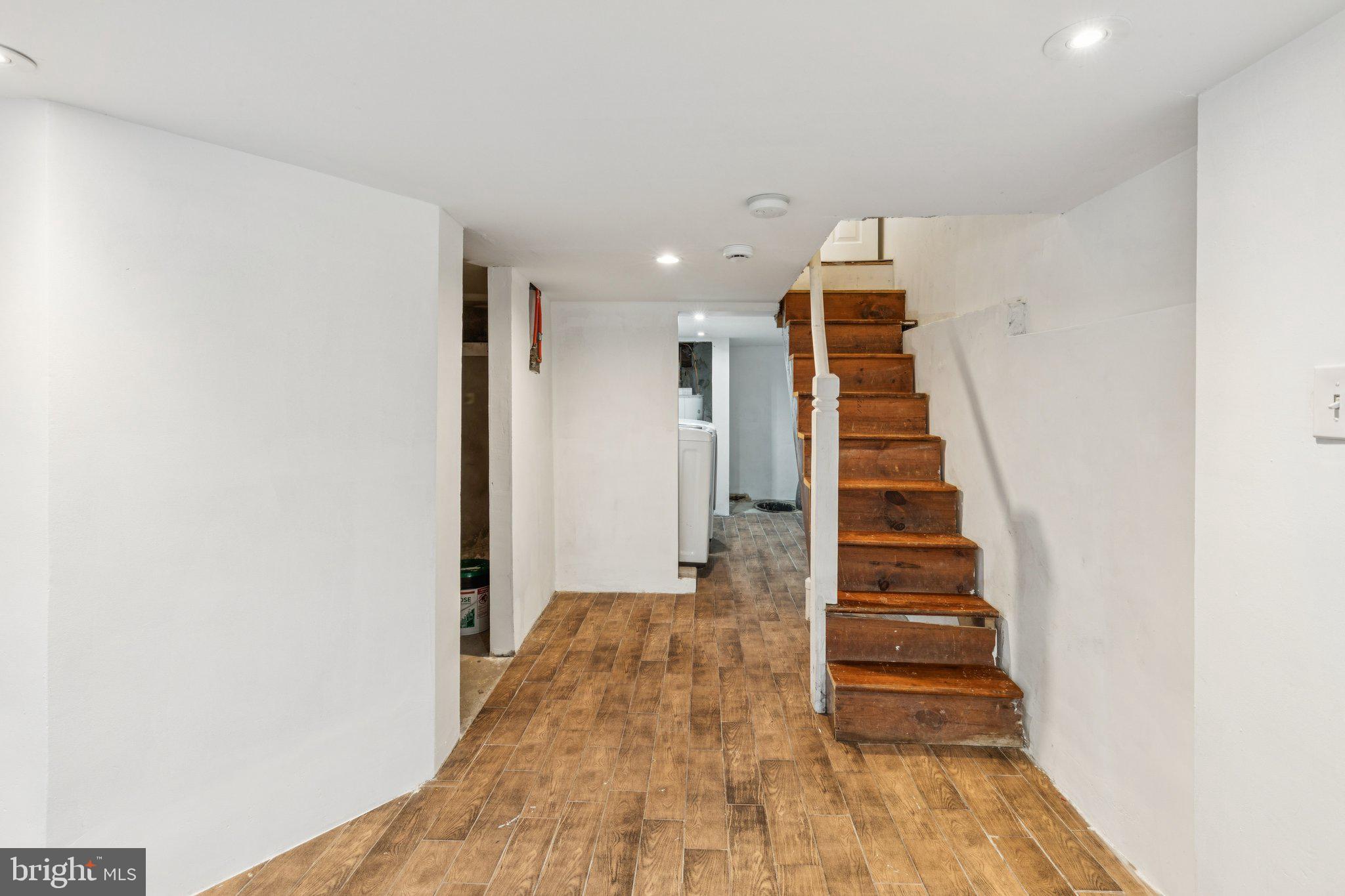 1444 North Perth Street Philadelphia, PA 19122 - Photo 23 of 27 a view of a hallway with stairs