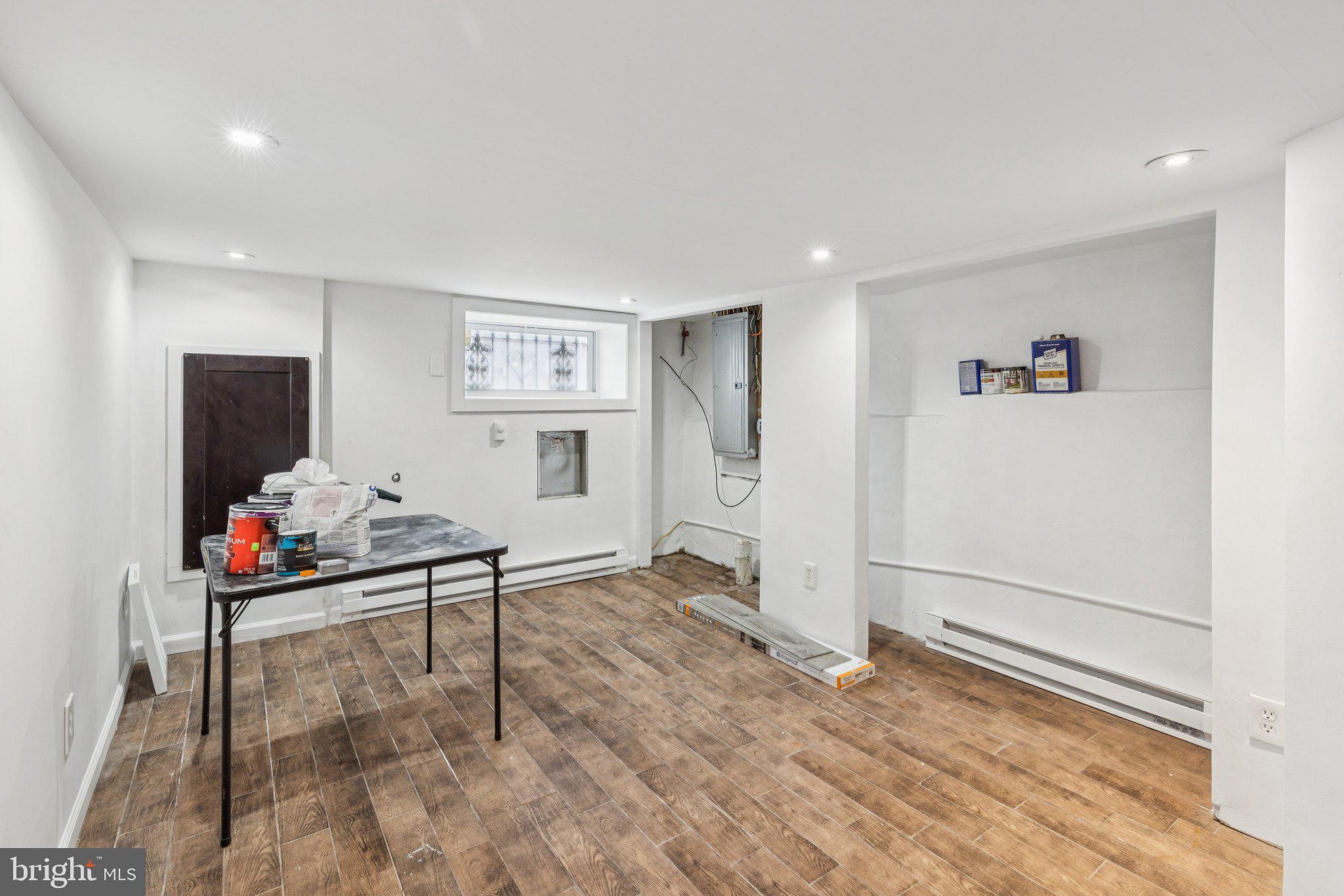 1444 North Perth Street Philadelphia, PA 19122 - Photo 24 of 27 a living room with furniture and a flat screen tv
