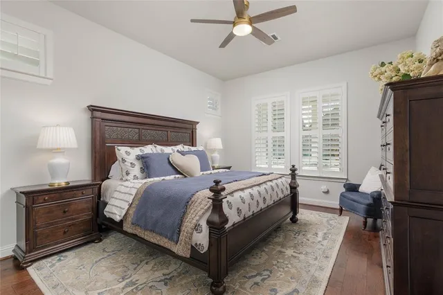 a bed room with a bed and a television