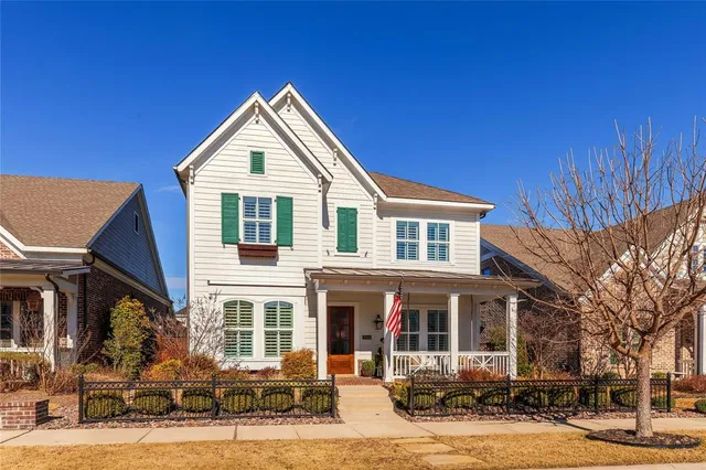 a view of a house with tub and garage