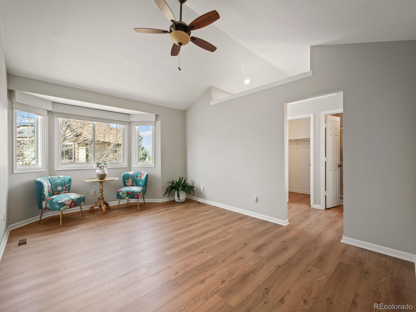 9358 Cornell Circle Highlands Ranch, CO 80130 - Photo 28 of 50 wooden floor in an empty room with a window