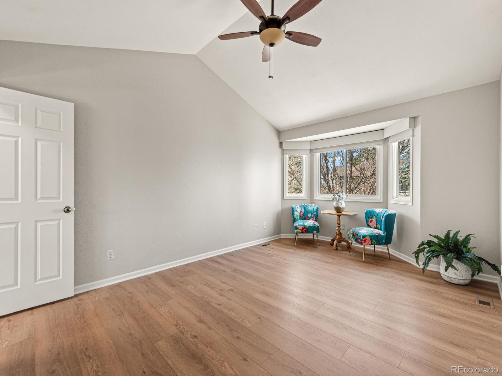 9358 Cornell Circle Highlands Ranch, CO 80130 - Photo 29 of 50 a view of a room with wooden floor and natural light