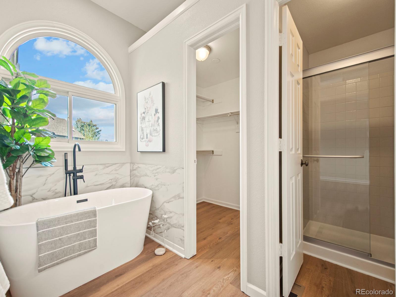 9358 Cornell Circle Highlands Ranch, CO 80130 - Photo 33 of 50 a bathroom with a sink and a mirror