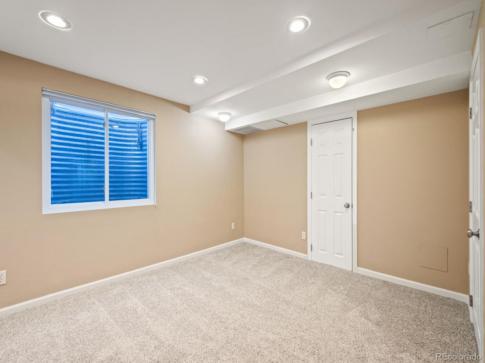 9358 Cornell Circle Highlands Ranch, CO 80130 - Photo 39 of 50 a view of an empty room with a window