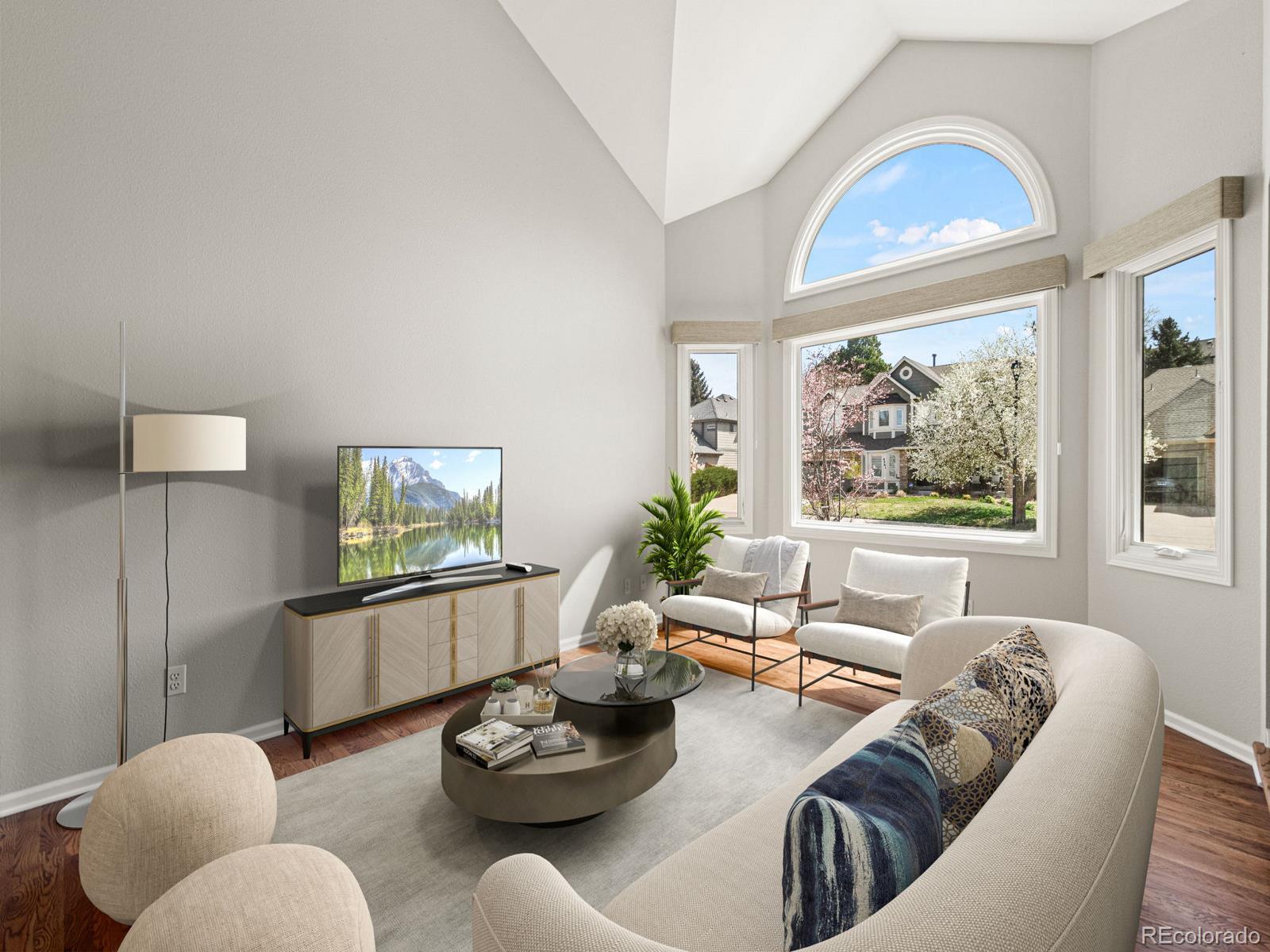9358 Cornell Circle Highlands Ranch, CO 80130 - Photo 6 of 50 a living room with furniture and a large window