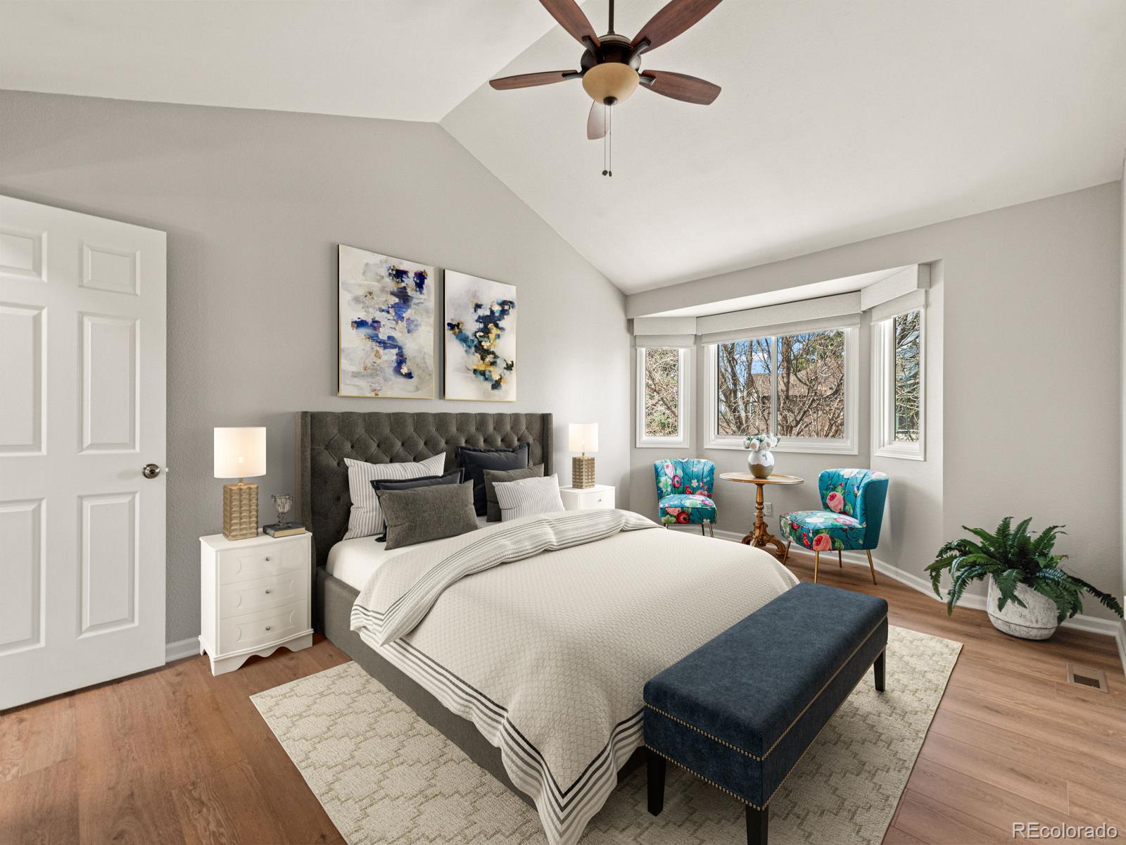 9358 Cornell Circle Highlands Ranch, CO 80130 - Photo 9 of 50 a bedroom with a large bed and a window