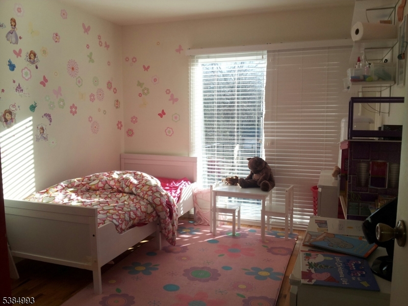 1 Carriage Way, Unit 12 Montclair, NJ 07042 - Photo 15 of 19 a bedroom with a bed and a window