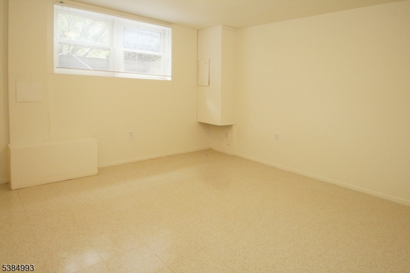 1 Carriage Way, Unit 12 Montclair, NJ 07042 - Photo 17 of 19 an empty room with a window