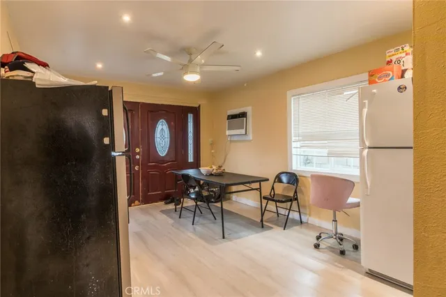 a workspace with furniture and a window