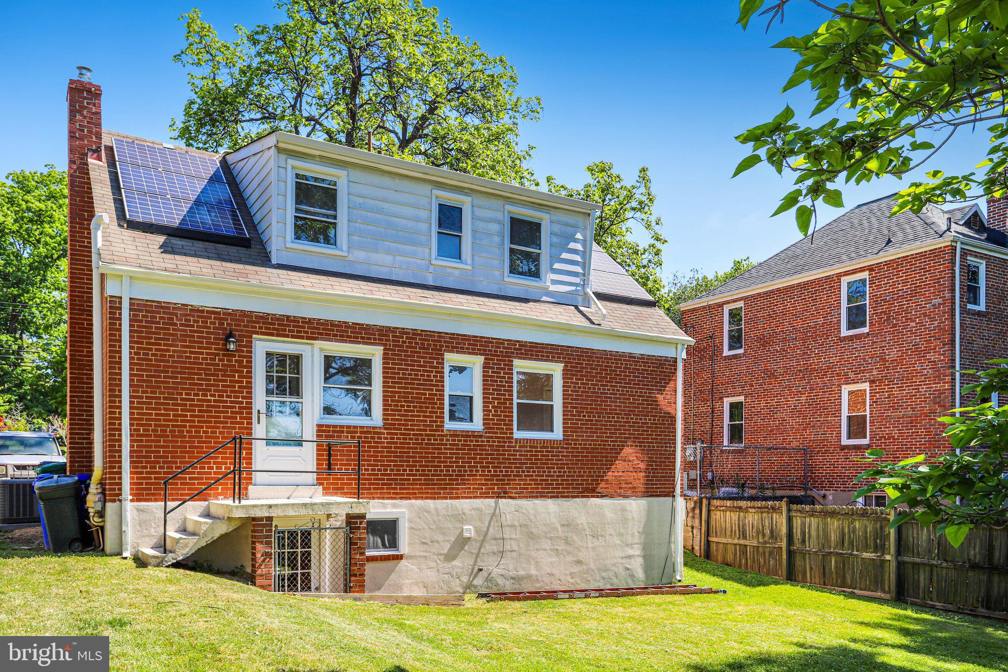 616 Ritchie Avenue Silver Spring, MD 20910 - Photo 30 of 37 a view of a house with a yard