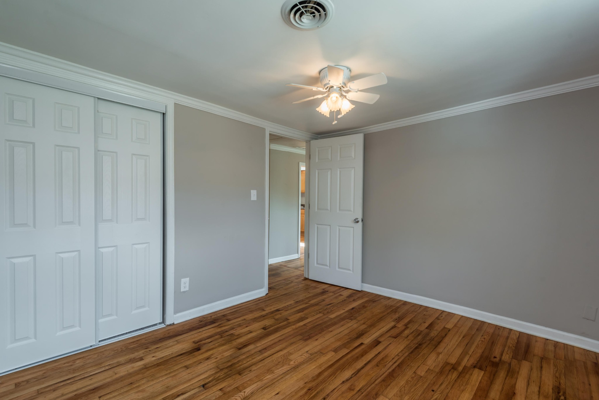 1460 Center Street Alcoa, TN 37701 - Photo 13 of 23 a view of an empty room with wooden floor