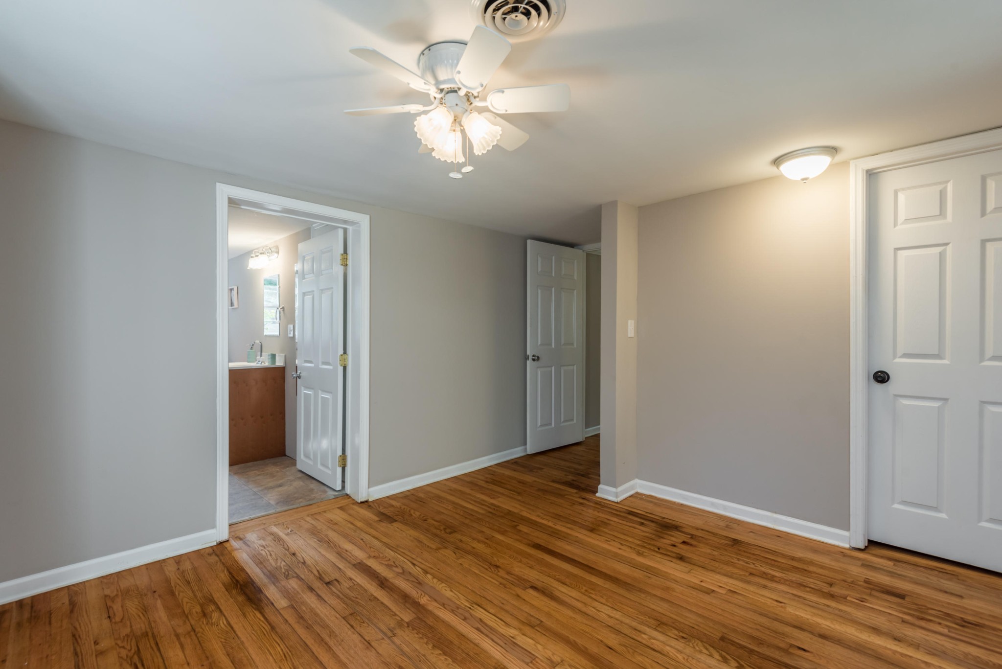 1460 Center Street Alcoa, TN 37701 - Photo 15 of 23 a view of a room with wooden floor and ceiling fan