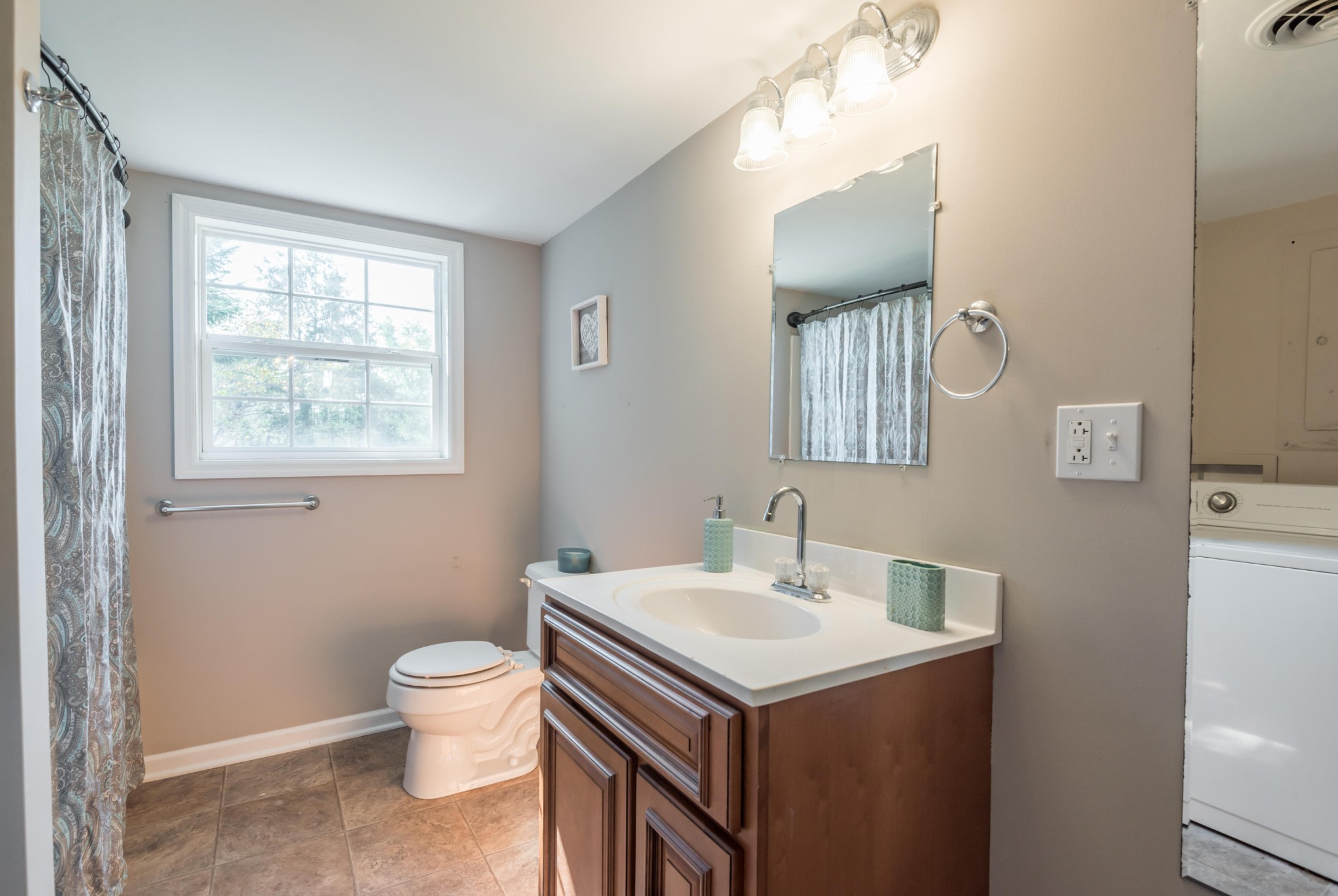 1460 Center Street Alcoa, TN 37701 - Photo 16 of 23 a bathroom with a toilet sink and mirror