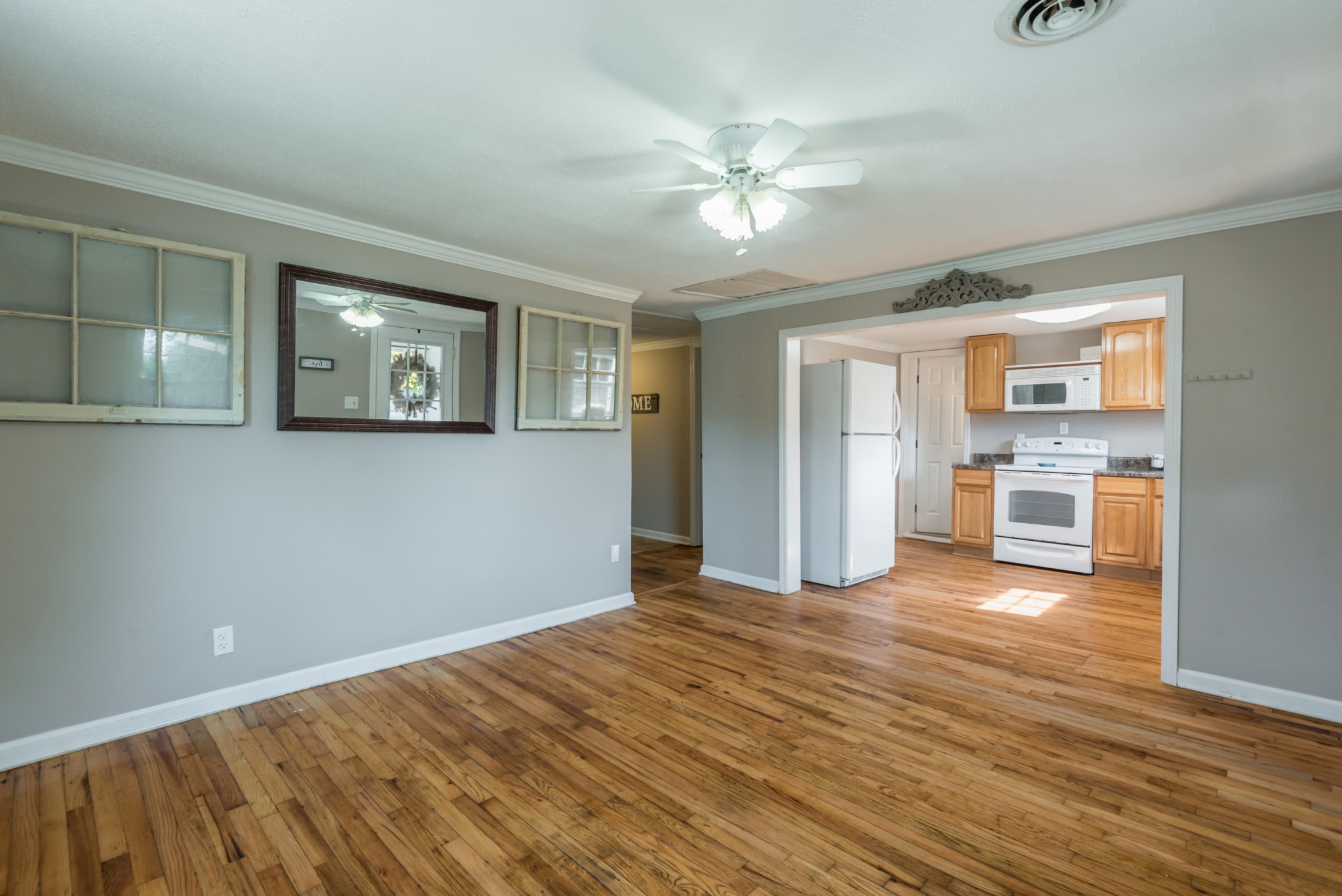 1460 Center Street Alcoa, TN 37701 - Photo 6 of 23 a view of a big room with wooden floor and workspace