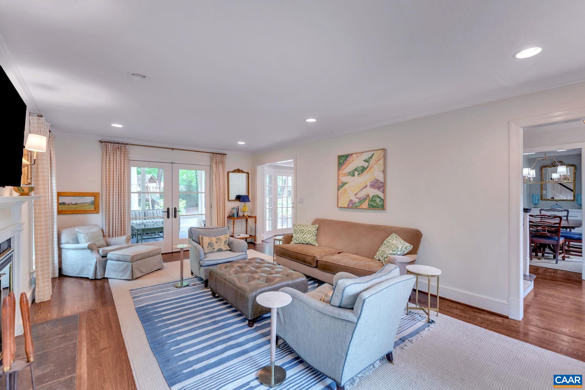 1445 Grove Road Charlottesville, VA 22901 - Photo 11 of 61 a living room with furniture or couch and a wooden floor