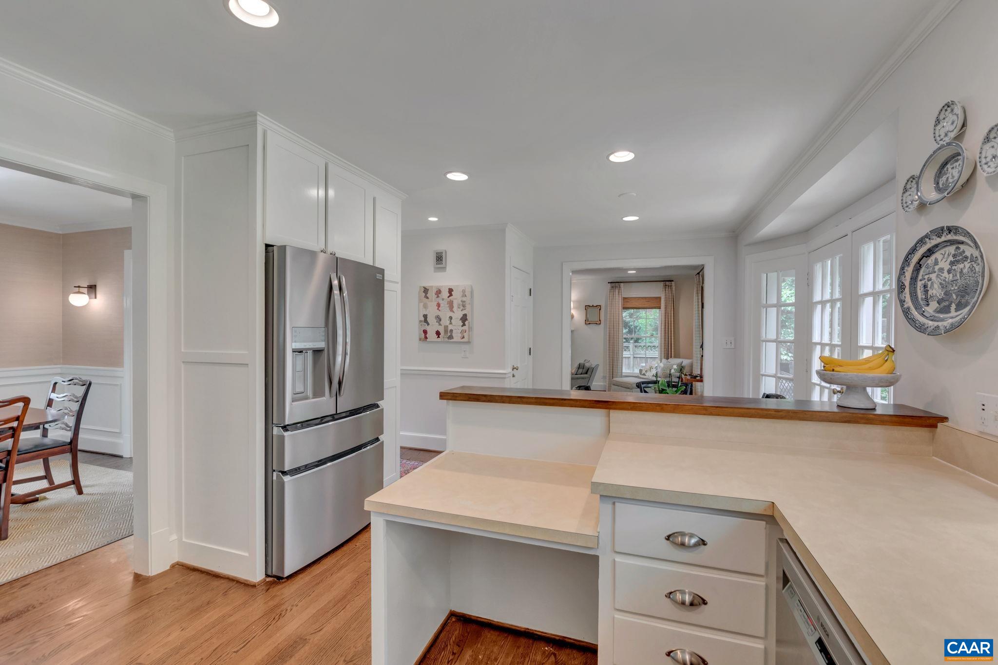 1445 Grove Road Charlottesville, VA 22901 - Photo 18 of 61 a kitchen with stainless steel appliances a refrigerator and a stove top oven