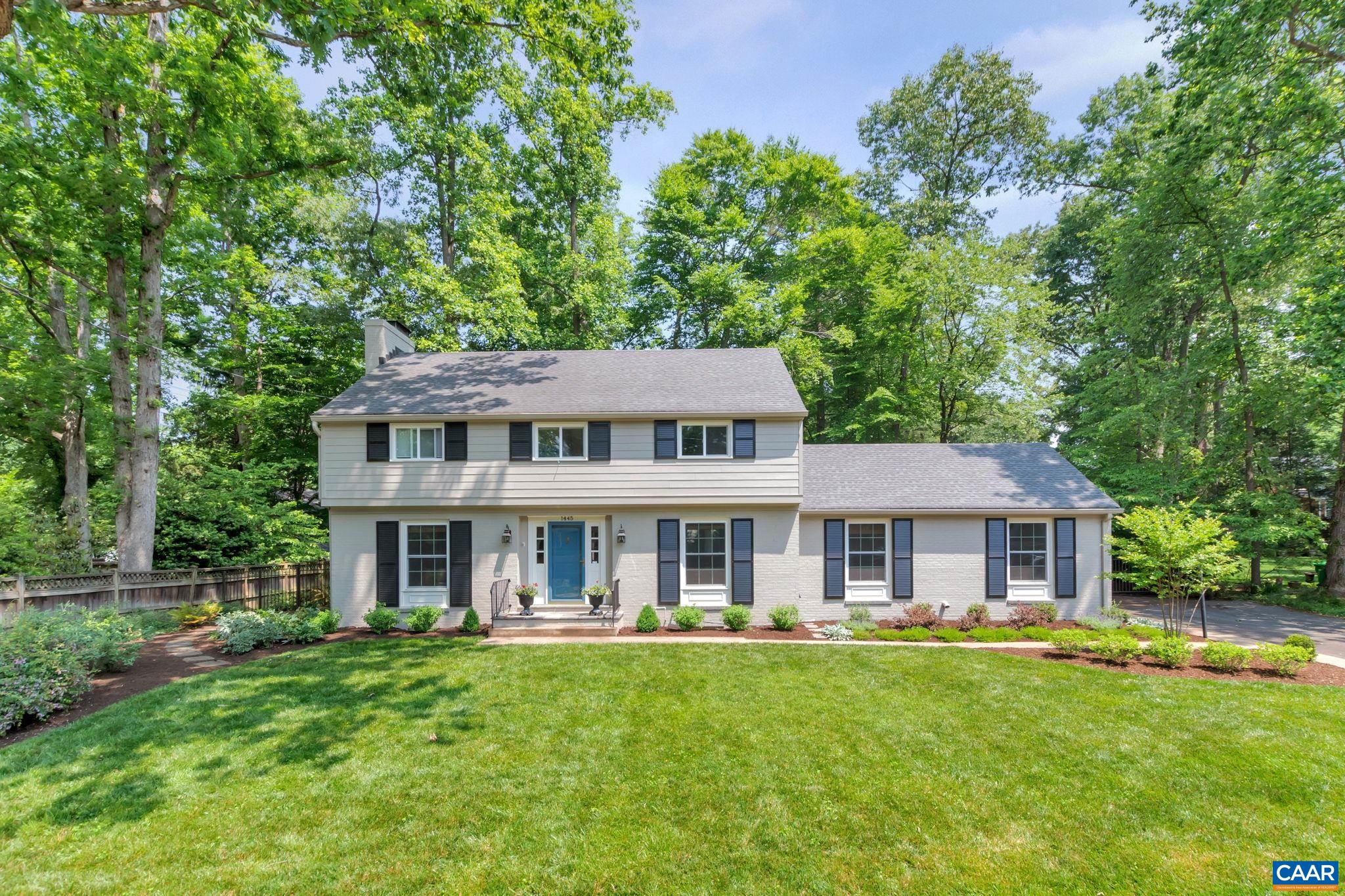 1445 Grove Road Charlottesville, VA 22901 - Photo 2 of 61 a front view of a house with yard patio and green space