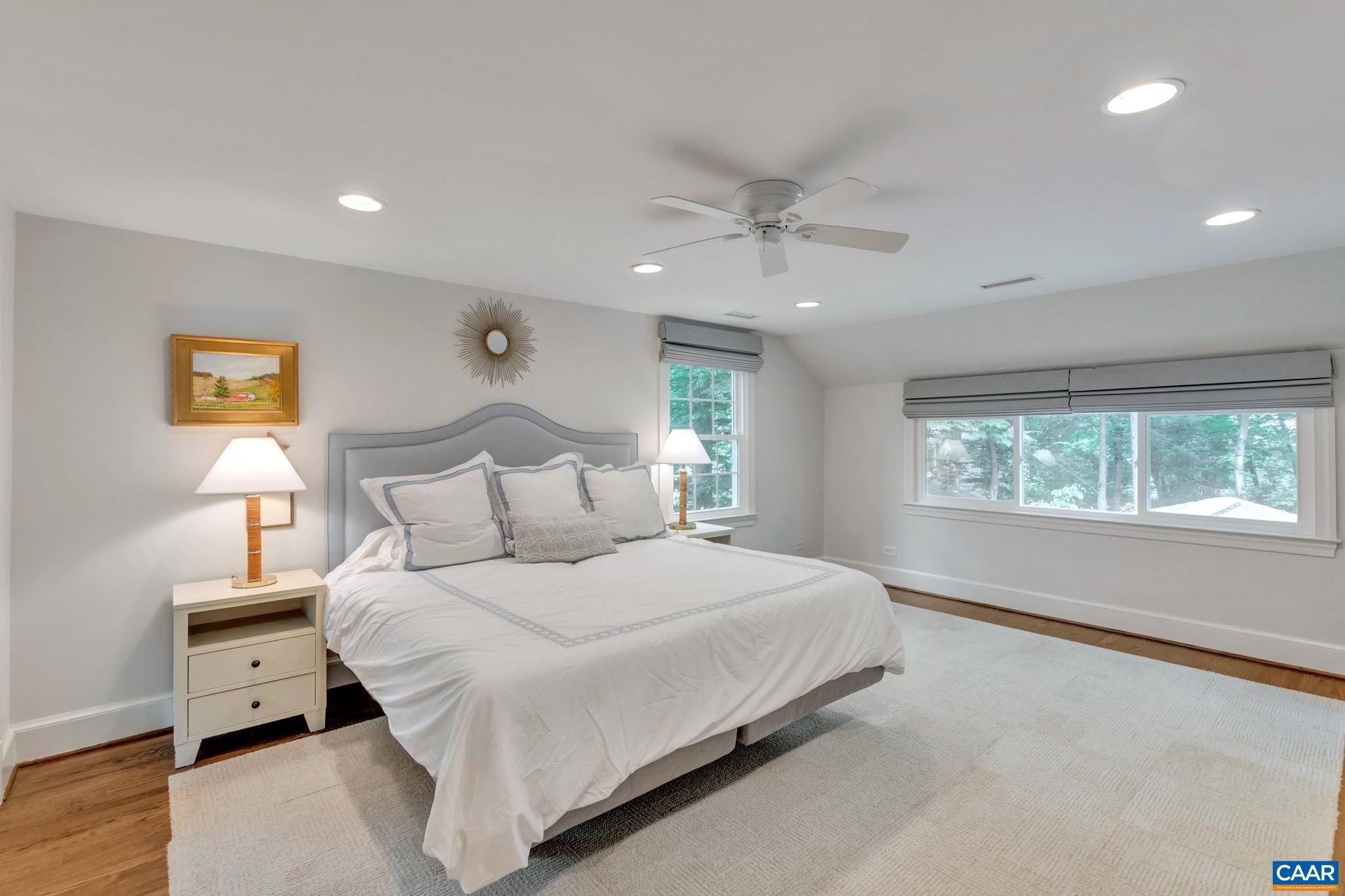 1445 Grove Road Charlottesville, VA 22901 - Photo 29 of 61 a large bedroom with a bed and a window