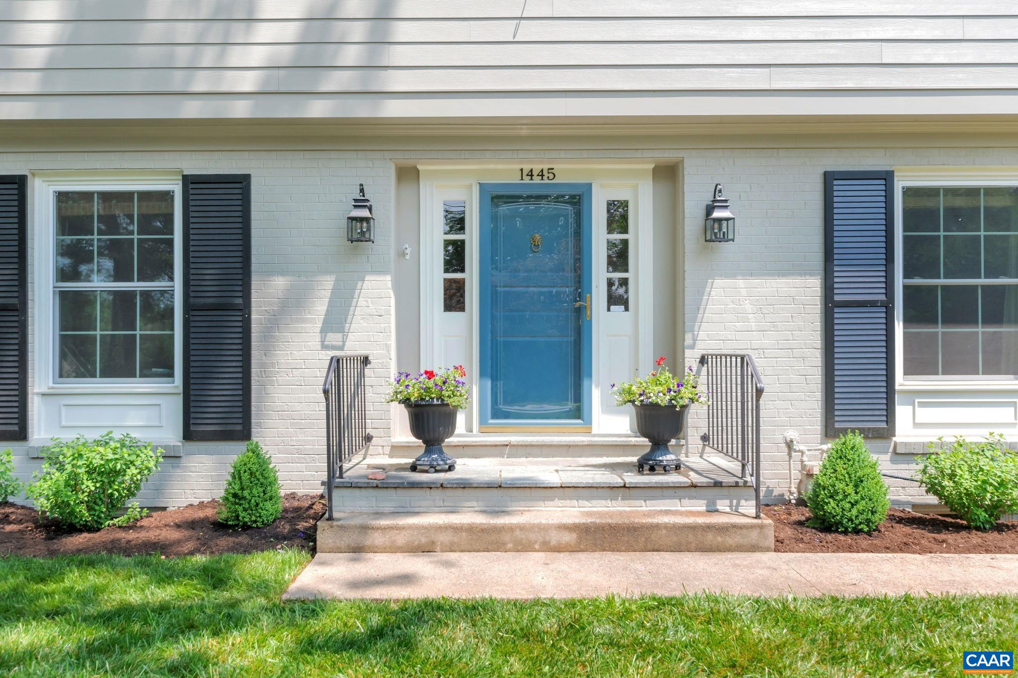 1445 Grove Road Charlottesville, VA 22901 - Photo 4 of 61 a front view of a house with garden and plants