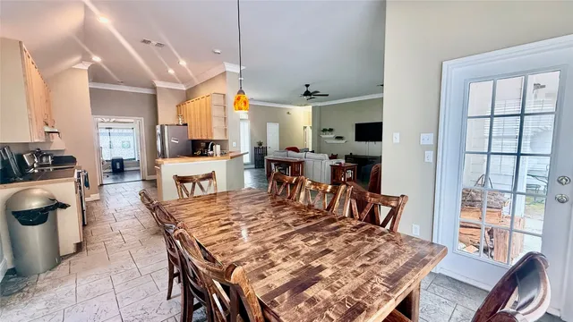a view of a dining room with furniture