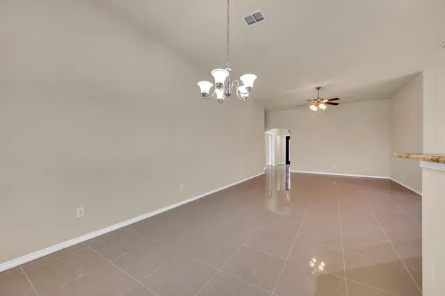 a view of a chandelier fan and a chandelier fan