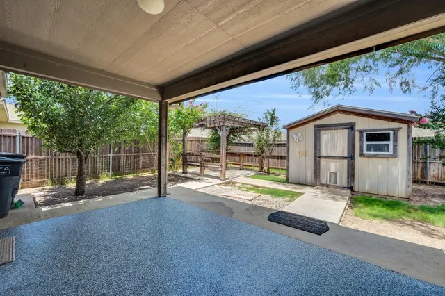 a house with trees in front of it
