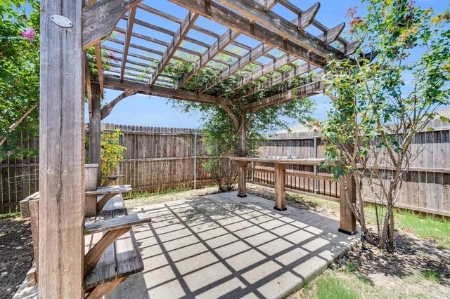 a view of house with a outdoor seating