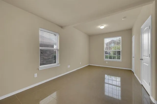 an empty room with windows