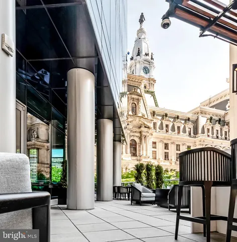a view of a house with a flower garden