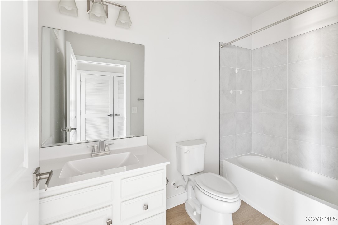 3700 Maze Runner Drive, Unit 405 Midlothian, VA 23112 - Photo 25 of 28 a bathroom with a sink toilet and shower