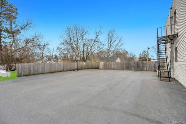 a view of backyard and tree