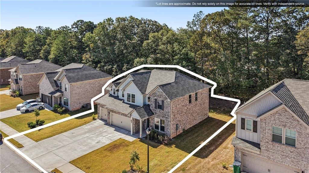120 Cabin Way Hampton, GA 30228 - Photo 41 of 51 a view of a house with roof deck front of house