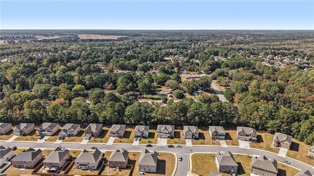 120 Cabin Way Hampton, GA 30228 - Photo 42 of 51 an aerial view of a city with lots of residential buildings