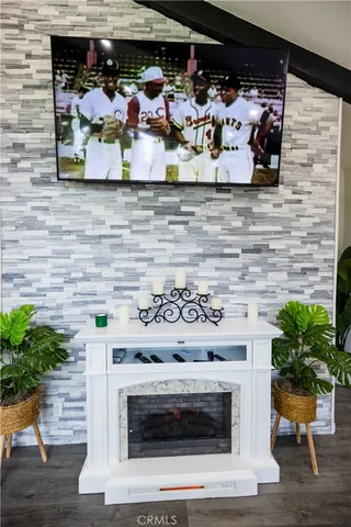 a living room with a couch and a flat screen tv