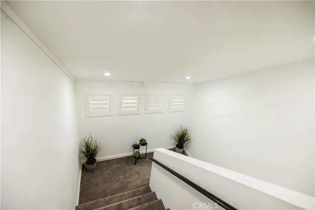 a bathroom with a shower and a toilet