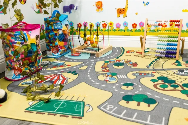 a view of balcony with wooden floor