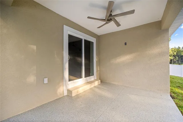 a view of a room with a large tree